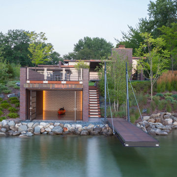 Lac La Belle - Modern Brick Lake Home with Dock and Boathouse