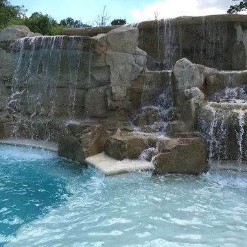 Cedar Rapids, Iowa - Custom Concrete Swimming Pool with Rock Waterfall Feature