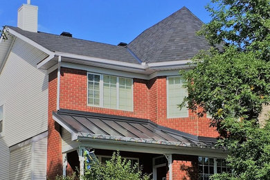 Example of a classic exterior home design in Calgary