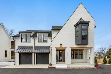 White house exterior photo in Nashville with a black roof