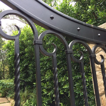 Hand forged Mediterranean style Double entry gate
