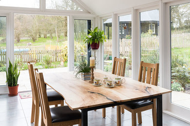 Design ideas for a medium sized rustic dining room in Hertfordshire.