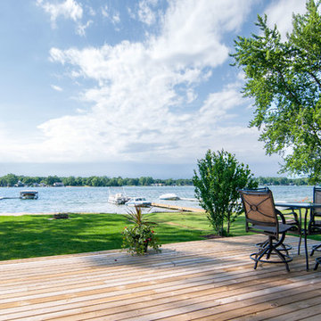 Additions Capitalizing on the Views along a Small Lake.