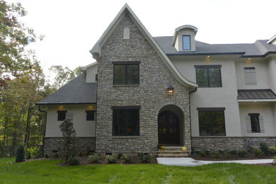 Example of a french country entryway design in Charlotte
