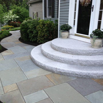 Curving Bluestone Walkway with Radius Granite Steps