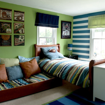 Example of a classic boy carpeted kids' room design in Boston with green walls