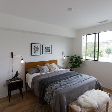 Woven Bench and Sheepskin in Modern Bedroom