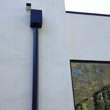 Modern Home with 3" Black Smooth Gutter System