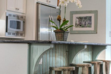 Example of a transitional kitchen design in New Orleans