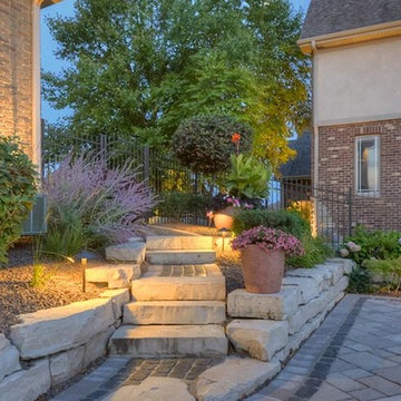 Cobblestone Landscape Renovation with Paver Pool Deck, Pergola, Outdoor Kitchen