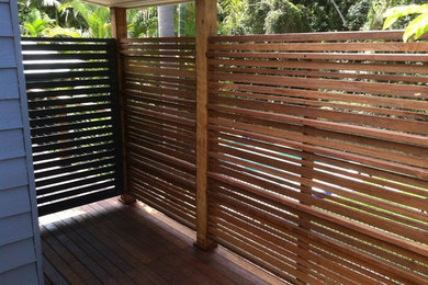 Design ideas for a mid-sized country side yard garden in Gold Coast - Tweed with a garden path and decking.