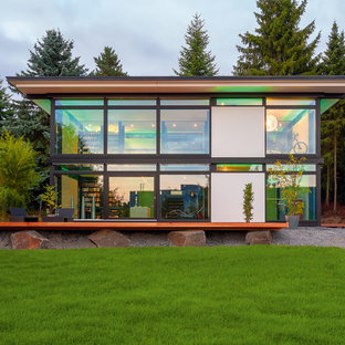 Geräumiges, Zweistöckiges Modernes Einfamilienhaus mit Mix-Fassade, Flachdach und Misch-Dachdeckung