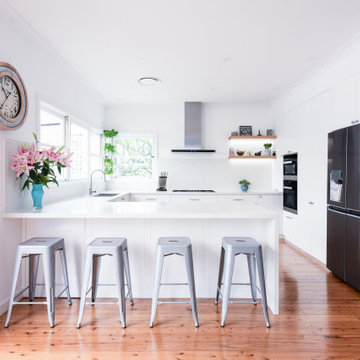 G-shape Kitchen with Stone Waterfall Benchtop