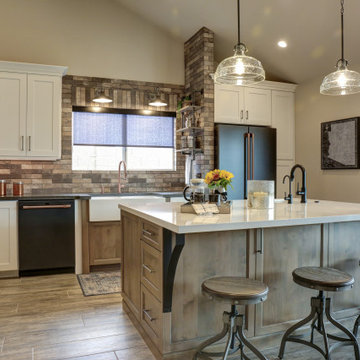 Mixture of white cabinets and warm woods make this an inviting space.