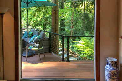 Inspiration for a large transitional backyard deck in Seattle.
