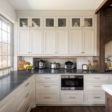 Painted Inset Cabinetry and Leathered Granite in a Transitional Edmond Kitchen