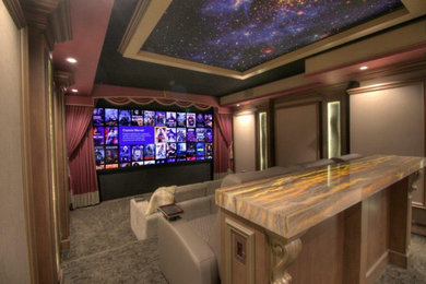 Home theater - contemporary home theater idea in Miami