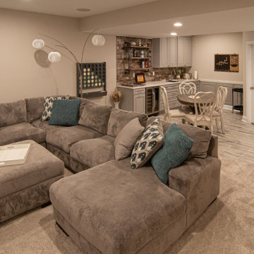 Basement With Entertainment Area for Family With Traditional Style Kitchenette