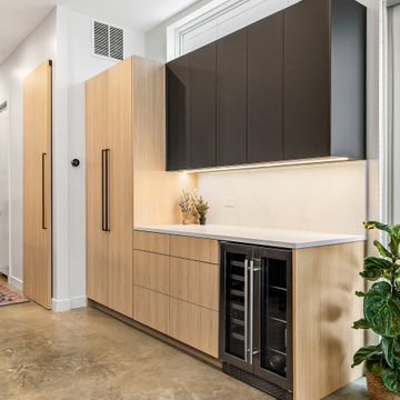 Sophisticated matte black and warm rift cut oak collision