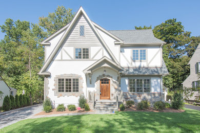 Traditional white two-story exterior home idea in New York with a shingle roof