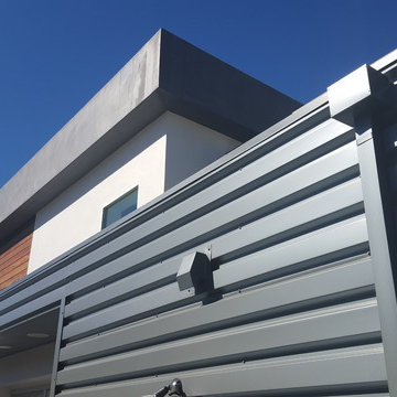 24 Gauge Steel, Collector Box and Downspout on Matching Wall Panels.