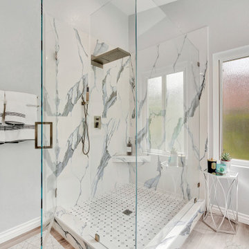 Marble-Look Walk-In Shower with Frameless Glass in Laguna Hills Bathroom Remodel