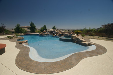 Inspiration for a large tropical pool remodel in Las Vegas