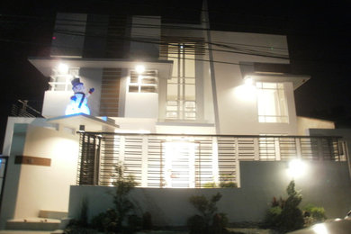 Example of a minimalist home design design in Other