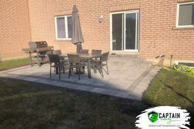 Patio - modern patio idea in Toronto
