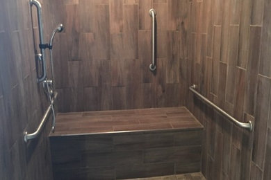 Example of a large transitional 3/4 brown tile and porcelain tile bathroom design in Other