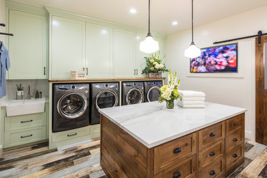 Example of a farmhouse laundry room design in Other
