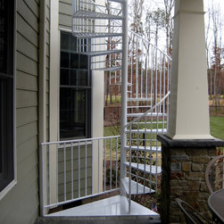 s007 Spiral Staircase with custom landing from Deck to patio in Glen Allen, Virg - Products