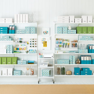 Design ideas for an expansive modern craft room in Other with white walls and painted wood flooring.