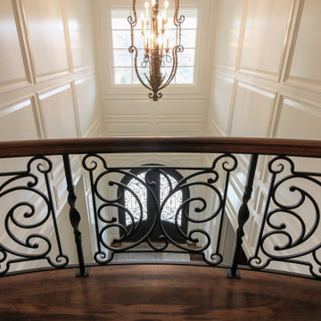 Project #74 | Circular Staircase with Hand-Forged Metal Panels