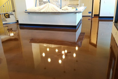 Concrete floor kitchen photo in Tampa