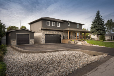 Example of an arts and crafts exterior home design in Toronto