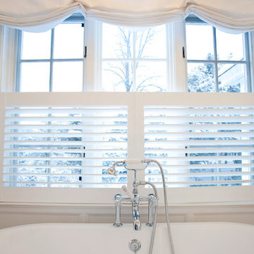 Floor mounted tub fill and hand shower