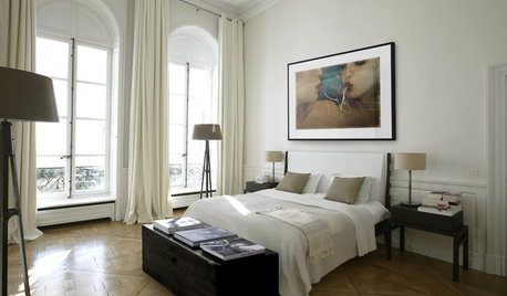 Accrochez une œuvre d'art au-dessus de votre lit
