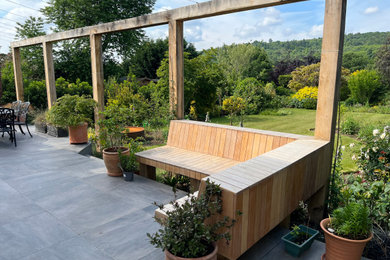This is an example of a modern patio in Surrey.