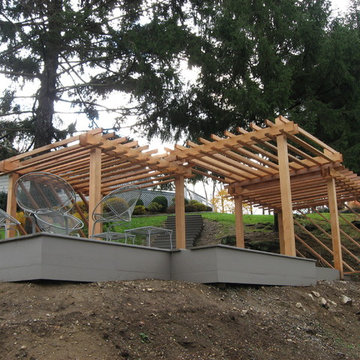 Shaded deck overlooking tennis court