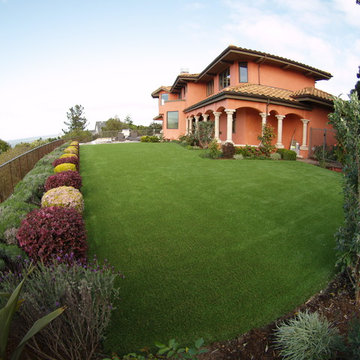 Artificial grass installation on backyard