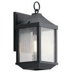 Kichler - Outdoor Wall 1-Light, Distressed Black - The 13.5" 1 light outdoor wall sconce from the Springfield collection offers classic style with a weathered effect. The hammered-look metal and Distressed Black finish give each fixture texture and character, while the seeded glass softly diffuses the light.