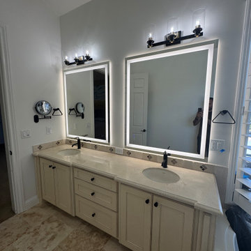 Curd-less walk-in shower; heated floors in bathroom + shower+bench LED