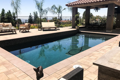 Inspiration for a transitional pool remodel in Los Angeles