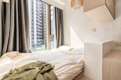 Inspiration for a modern bedroom remodel in Hong Kong