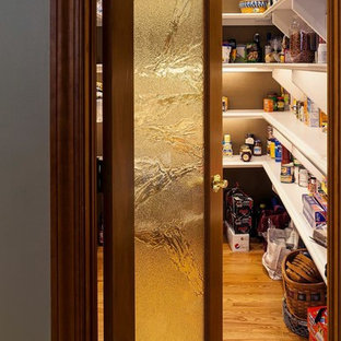 Large transitional kitchen pantry remodeling - Example of a large transitional light wood floor kitchen pantry design in Cleveland with white backsplash, glass tile backsplash and stainless steel appliances