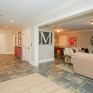 Inspiration for an expansive victorian walk-out basement in Other with grey walls, ceramic flooring and multi-coloured floors.