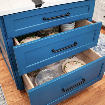 Kitchen with White Perimeter and Blue Island Cabinet Reface