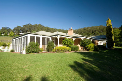 Design ideas for a country home design in Central Coast.