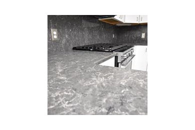 Inspiration for a kitchen remodel in Boston with granite countertops and granite backsplash